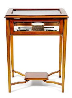 A Sheraton Style Satinwood Inlaid Vitrine Table, Height 30 x width 22 1/4 x depth 15 inches.