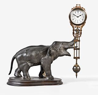 A figural elephant swinging mystery clock by Junghans