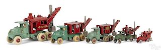 Five Hubley graduated cast iron steam shovel trucks with nickel-plated buckets