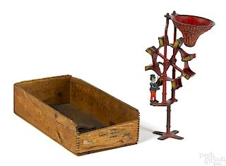 Ives Excelsior series cast iron sand toy, with the original box, 11 1/2'' h. Provenance: Max Berry