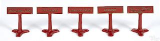 Five Arcade cast iron Burma Shave advertising road signs, 2 1/2'' h.