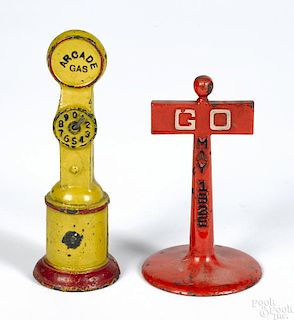 Arcade cast iron Gas pump, 6 1/4'' h., together with an Arcade Go - May 1925 sign, 5'' h.