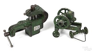 Two Vindex cast iron toys, to include a John Deere hit and miss gas engine, 3 1/4'' h.
