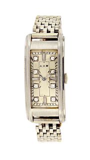 An early 20th century platinum and gold Agassiz elongated tank wrist watch