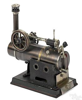 Falk overtype single cylinder steam engine with a geared flywheel and water pump, 11'' h., 8'' w.
