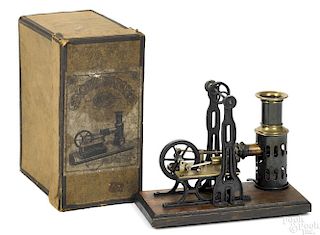 Ernst Plank hot air engine, in original box, mounted on a decorated wood base