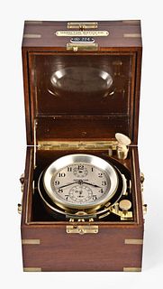 A Hamilton model 21 marine chronometer with boxes