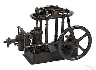 Walking beam engine in heavy cast iron, possibly an early model by Stewart, 9'' h., 12'' w.