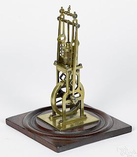 Brass overhead cylinder steam engine model, sturdily crafted, with a sand cast cylinder