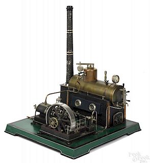 Doll et Cie steam plant with a horizontal boiler, a sight glass, a pressure gauge