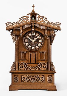 Gordian Hettich & Sohn shelf cuckoo clock in oak fretwork case with cuckoo bird inside cupola