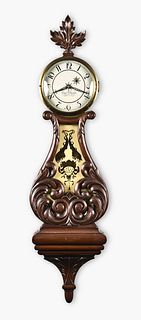 Elmer O. Stennes carved hanging lyre clock
