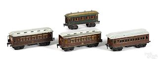 Four Marklin painted tin train coaches, gauge 1, to include two 1894 restaurant cars