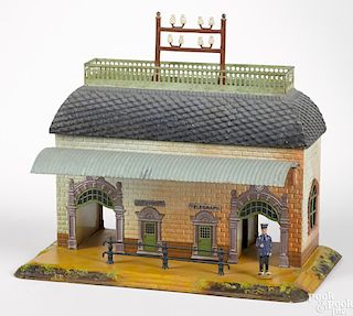 Bing embossed and painted tin train station with double archways, 12'' h., 14'' w., 8'' d.