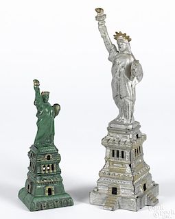 Two Kenton cast iron Statue of Liberty still banks, 9 5/8'' h. and 6 1/2'' h.