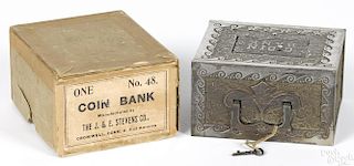 J. & E. Stevens nickel-plated cast iron Coin still bank with the original box, 4 1/4'' h.