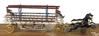 Large Wilkins cast iron horse drawn ladder wagon with painted cast iron drivers