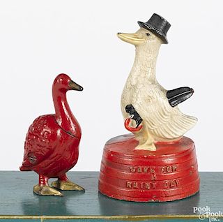 Two cast iron still banks, to include an Arcade Red Goose School Shoes, 3 3/4'' h.