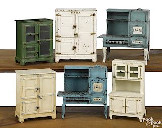 Six Hubley cast iron kitchen stoves and refrigerators, tallest - 9''.