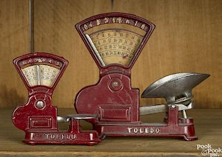 Two Kilgore cast iron Toledo counter scales, 6'' h. and 4'' h.