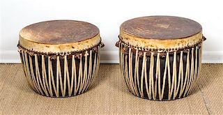 A Pair of African Leather and Hide Covered Drum Tables,