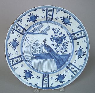 English delft blue and white charger, ca. 1730, wi