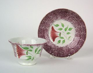 Red/purple spatter cup and saucer, 19th c., with t