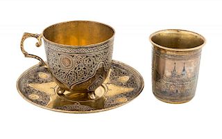 A GILT SILVER CUP AND SAUCER WITH A TUMBLER, CUP AND SAUCER MARKED P. OVCHINNIKOV WITH IMPERIAL WARRANT, MOSCOW, 1870-1873