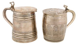 A PAIR OF RUSSIAN SILVER STEINS WITH HINGED COVERS IN THE NEO-RUSSIAN STYLE, VARIOUS MAKERS, MOSCOW, MID 1800S AND EARLY 1900
