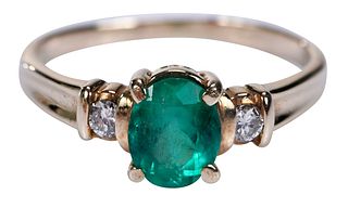 14kt. Oval Shape Emerald with Two Round Cut Diamond Ring