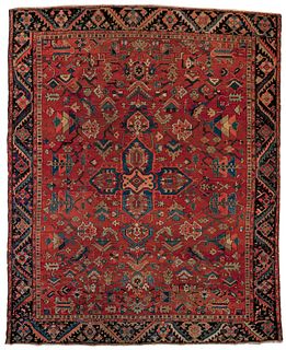Roomsize Heriz rug, ca. 1920, with a central medal