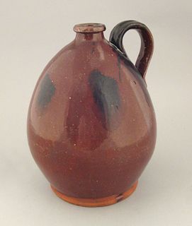 New England redware jug, 19th c., with manganese s