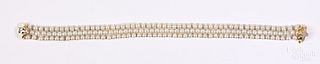 18K gold and pearl bracelet with diamond clasp