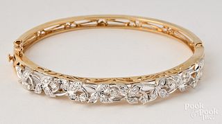 14K two toned gold and diamond bangle bracelet
