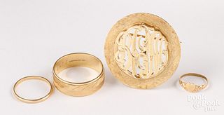 Three 14K gold rings and a pendant