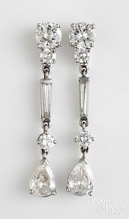 Pair of 14K white gold and diamond earrings