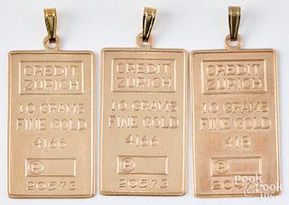Three 1g fine gold pendants