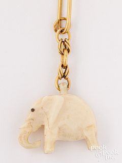 18K gold necklace with bone elephant pendant