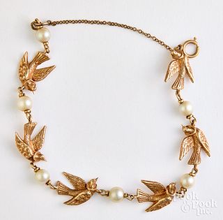 14K gold and pearl bird bracelet