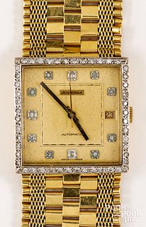 Juvenia 18K gold wristwatch with diamond bezel