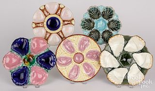 Five majolica oyster plates