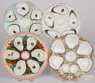 Four oyster plates