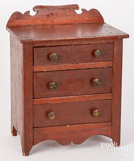 Doll-sized stained pine chest of drawers, 19th c.