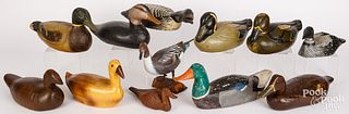 Nine carved and painted duck decoys