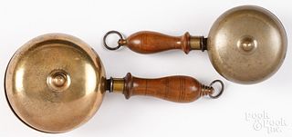 Two brass huckster bells, 19th c.