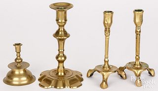 Four brass candlesticks