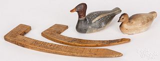 Two miniature carved and painted duck decoys
