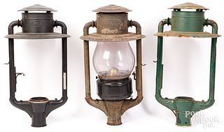 Three Dietz Pioneer pole lanterns, 19th c.