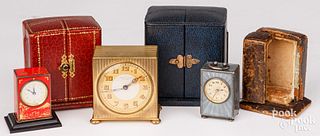 Three miniature cased travel clocks, early 20th c.