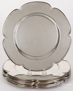 Set of eight sterling silver plates